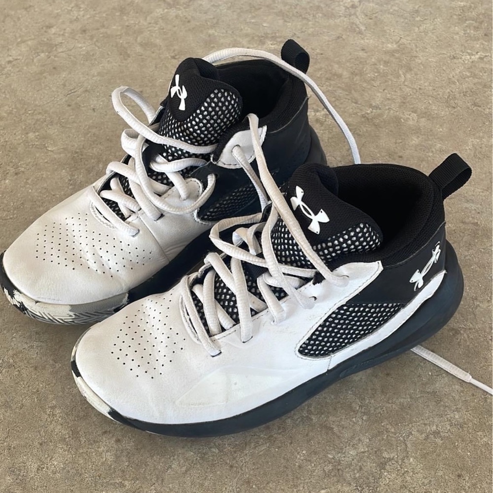 Boys basketball shoe or street shoe.